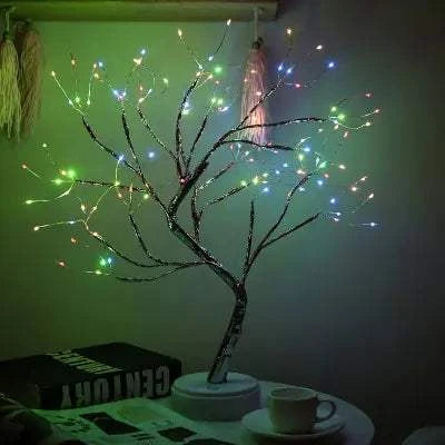 Mini Christmas Tree - LED LampIlluminate Your Holidays with EleganceBrighten up your festive season with our Mini Christmas Tree - LED Lamp. Its delicate design and warm LED lights create a magicAlphas lightAlphas lightMini Christmas Tree