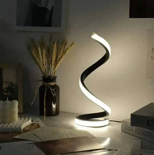 LED Spiral Table Lamp with sleek black spiral design and bright white LED light, featuring modern USB-powered illumination