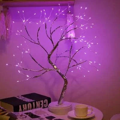Mini Christmas Tree LED lamp with silver flexible wire branches illuminated by warm white LED lights in a compact indoor decorative design