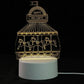 3D LED Lamp with yellow glowing carousel horses and Happy Holidays sign, clear acrylic design on white base