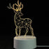 3D LED Lamp featuring a geometric reindeer design illuminated in warm yellow light on a white circular base