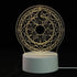 3D LED Lamp with white base featuring a round optical illusion design of sun and moon symbols in warm white light
