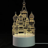 3D LED Lamp with a white base and intricate yellow light pattern resembling a Russian-style cathedral with domes and towers