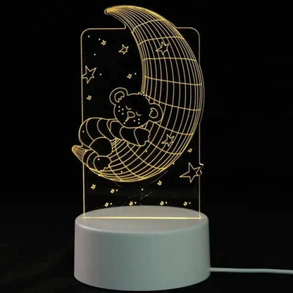 3D LED Lamp with a white base featuring an illuminated design of a teddy bear sleeping on a crescent moon surrounded by stars in soft yellow light