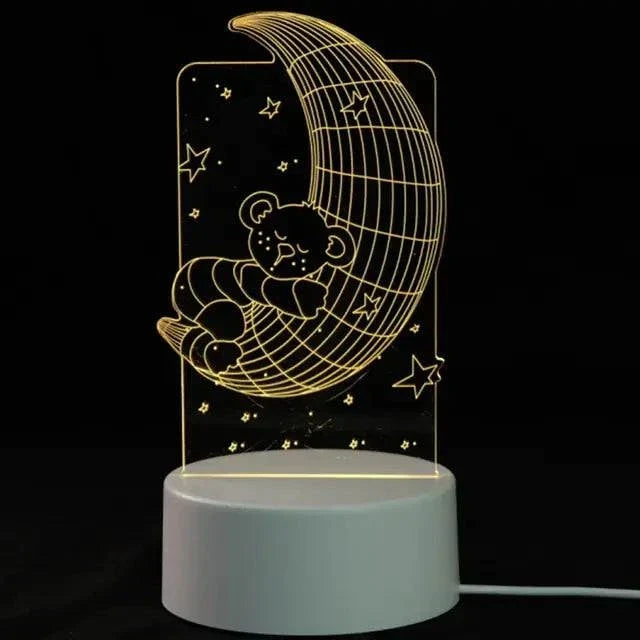 3D LED Lamp with a white base featuring an illuminated design of a teddy bear sleeping on a crescent moon surrounded by stars in soft yellow light