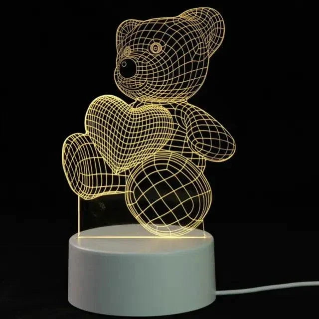 3D LED Lamp featuring a yellow wireframe teddy bear holding a heart, with a white round base and illuminated lines
