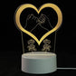 3D LED Lamp featuring a glowing yellow heart outline with two hands making a pinky promise and two roses below