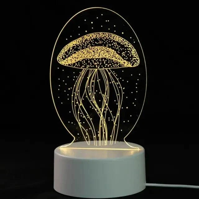 3D LED Lamp with a white base and yellow illuminated jellyfish optical illusion design in a clear oval frame