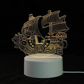 3D LED Lamp featuring a yellow illuminated pirate ship design with intricate line details on a white circular base