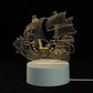 3D LED Lamp featuring a yellow illuminated pirate ship design with intricate line details on a white circular base
