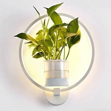 Modern wall plant LED lamp with greenery and soft LED lighting on white wall