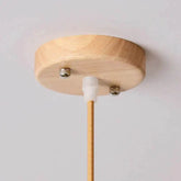 Kuma Bamboo Lamp emitting warm light with eco-friendly bamboo design in cozy room setting
