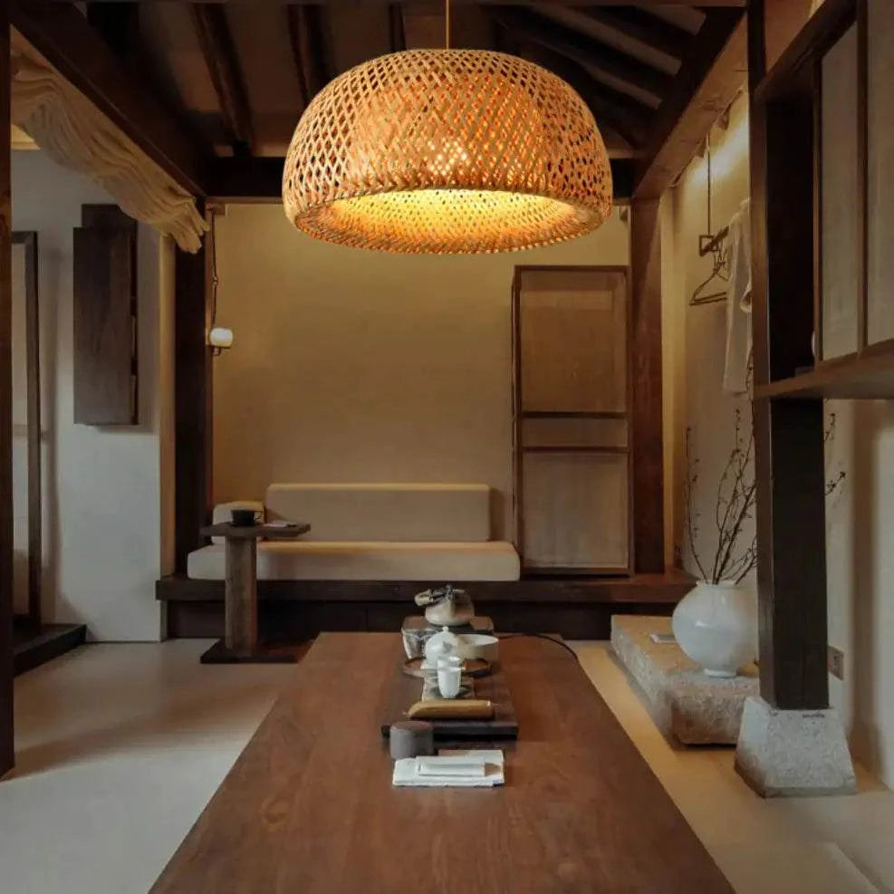 Kuma Bamboo Lamp emitting warm light with eco-friendly bamboo design in modern interior