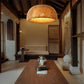 Kuma Bamboo Lamp emitting warm light with eco-friendly bamboo design in modern interior