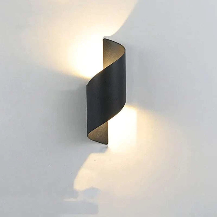 LED waterproof outdoor wall lamp with sleek design and energy-efficient lighting installed on a patio wall