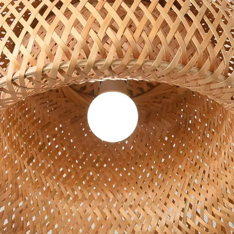 Kuma Bamboo Lamp with warm glow and eco-friendly bamboo design for cozy home ambiance