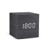 Alarm LED Watch, black wooden cube clock with a bright white digital LED display showing 18:00