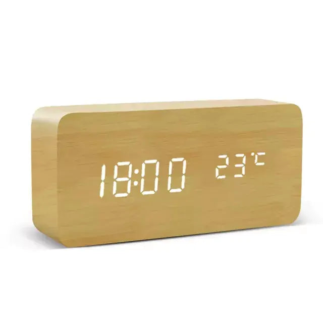 Alarm LED Watch with a rounded natural wood casing and bright white digital display showing time and temperature