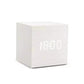 Alarm LED Watch, a white cube-shaped digital clock with a bright LED time display and smooth wooden finish