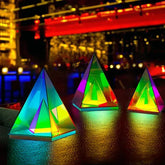 Aura Pyramid Lamp trio with multicolored glowing translucent acrylic pyramids creating vibrant ambient lighting