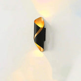 Modern LED waterproof outdoor wall lamp on exterior wall, sleek and durable design for energy-efficient outdoor lighting