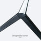 Corner Floor Lamp with a sleek black metal frame, white light panel and angled corner-fitting design