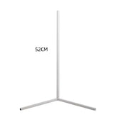 Corner Floor Lamp with slim white metal frame and three-pronged base, measuring 52cm tall