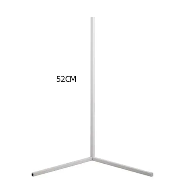 Corner Floor Lamp with a slim white metal frame and three-pronged base, featuring a minimalist vertical design
