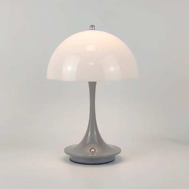 Portable rechargeable LED lamp with dimming and USB charging in modern metal design