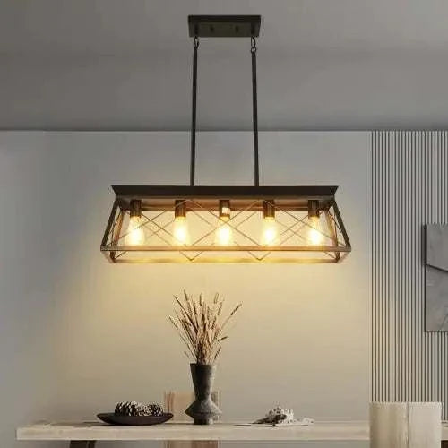 Farmhouse Chandelier with black metal frame and five exposed warm light bulbs in a rectangular cage design above a dining table