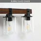 Farmhouse Dresser Lamps with black iron frame and walnut wood accent featuring transparent bubble glass shades