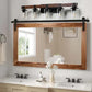 Farmhouse Dresser Lamps with black iron frame and walnut-colored glass shades mounted above a wooden framed bathroom mirror