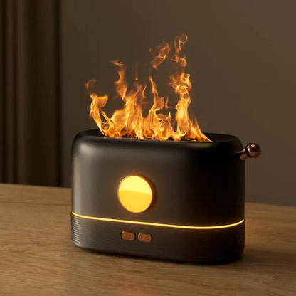 Flame Aroma Diffuser with black matte finish, circular yellow LED light, and realistic flame effect on top