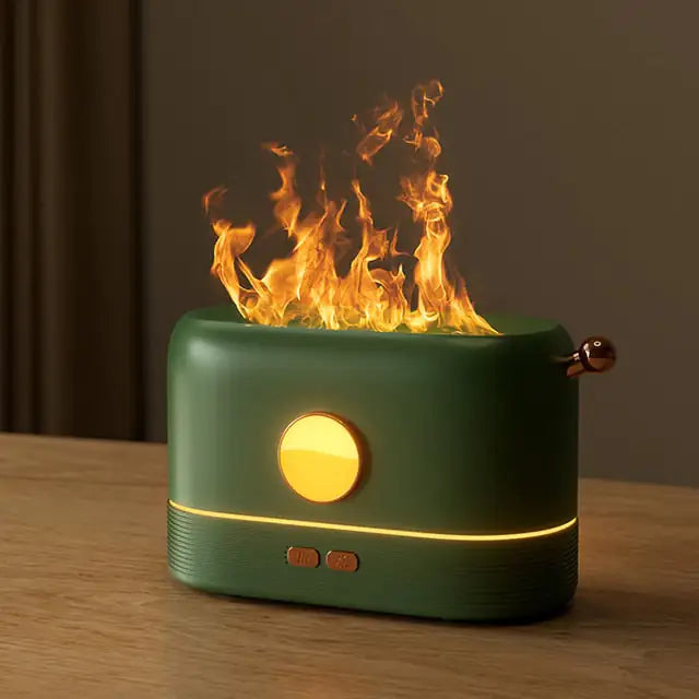 Flame Aroma Diffuser in dark green with a golden knob and lever, emitting realistic flame-like visual effect on top