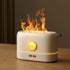 Flame Aroma Diffuser in white and gold tones with flickering flame effect and compact modern design on wooden surface