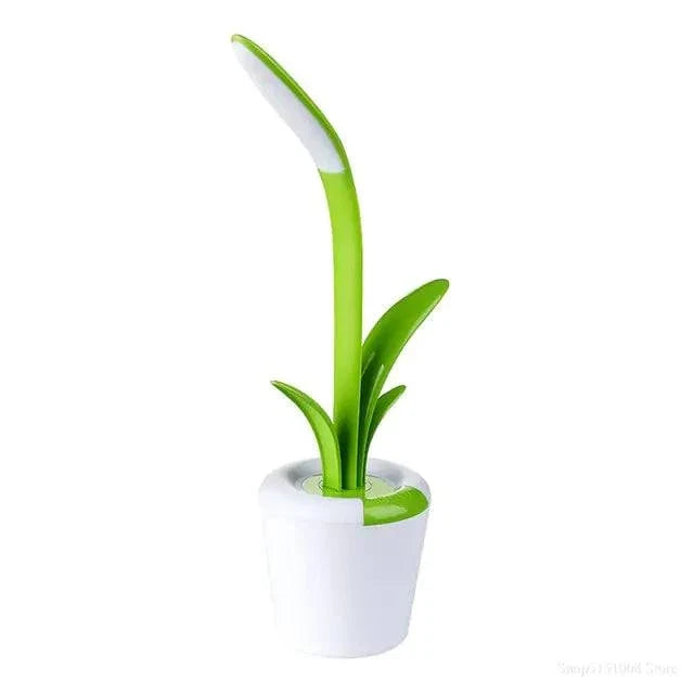Flower Lamp featuring a modern green and white plastic design mimicking a flower growing from a pot with an elongated light stem