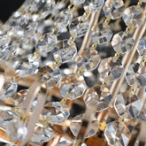 Golden Crystal Chandelier with clear faceted crystal strands and polished gold metal accents