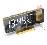 LED Digital Projection Clock in gold ABS material with large white LED display showing time, temperature, humidity, and red time projection.