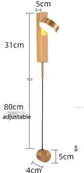 LED indoor Wall Lamps featuring a modern adjustable design in warm metallic finish with a sleek cylindrical shade and thin cord