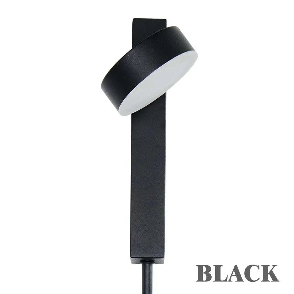 LED indoor Wall Lamps featuring a sleek black metal body with a rounded white diffuser, designed for wall mounting