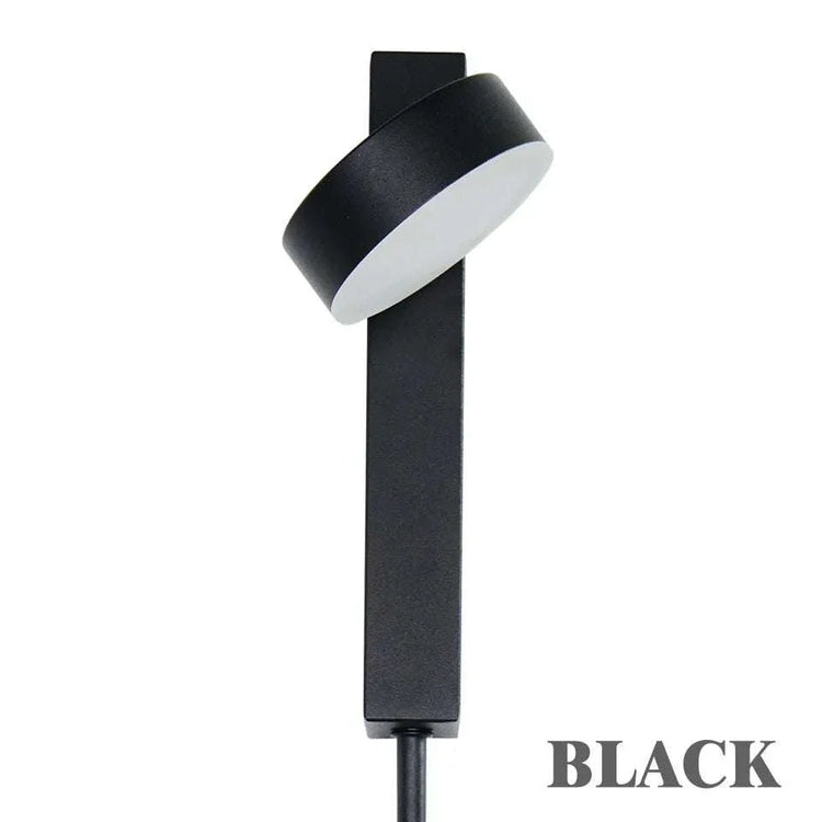 LED indoor Wall Lamps featuring a sleek black metal body with a rounded white diffuser, designed for wall mounting