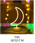 LED Neon Light shaped like a crescent moon with warm yellow glow on a white base, ideal for decorative indoor use
