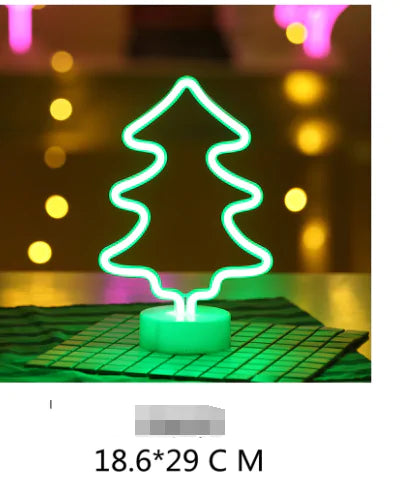 LED Neon Light shaped like a green glowing Christmas tree mounted on a small round base, perfect for festive decoration