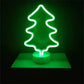 LED Neon Light in bright green shaped like a Christmas tree with a clear round base, battery-operated decorative lamp