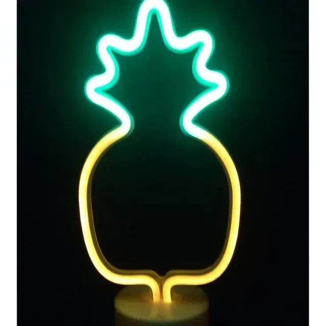 LED Neon Light in the shape of a pineapple with yellow and green vibrant glowing PVC tubes mounted on a clear base