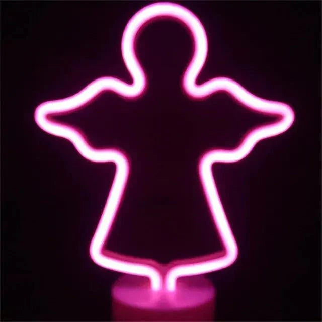 LED Neon Light shaped like an angel glowing vibrant pink on a clear round base ideal for decorative use