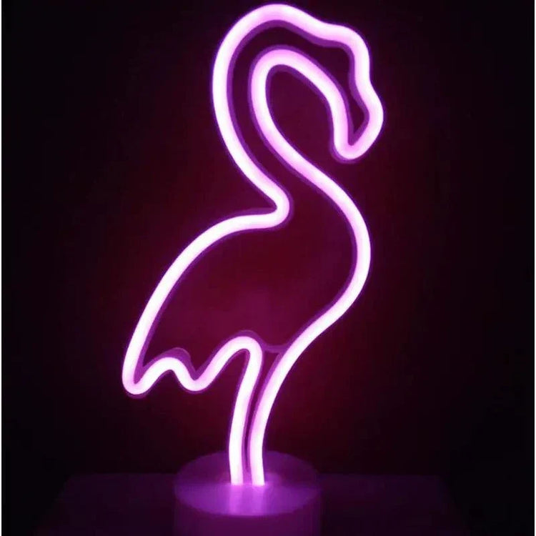 LED Neon Light shaped like a pink flamingo with vibrant glow on a round clear base for decorative use indoors