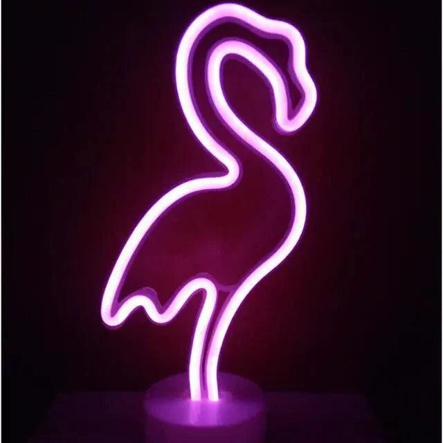 LED Neon Light in vibrant pink shaped like a flamingo with a smooth curved design on a round base