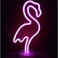 LED Neon Light in vibrant pink shaped like a flamingo with a smooth curved design on a round base