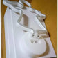 White LED Neon Light in the shape of a reindeer with clear plastic base and battery compartment visible, unlit